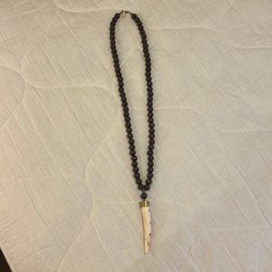 Brown beaded tusk necklace